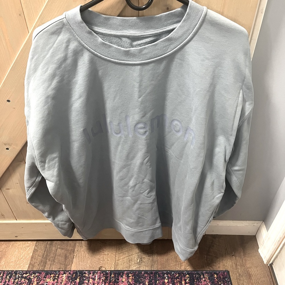Oversized blue Lululemon women’s sweatshirt.